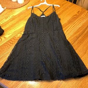 Black tank top lace pattern dress with crisscross back detail